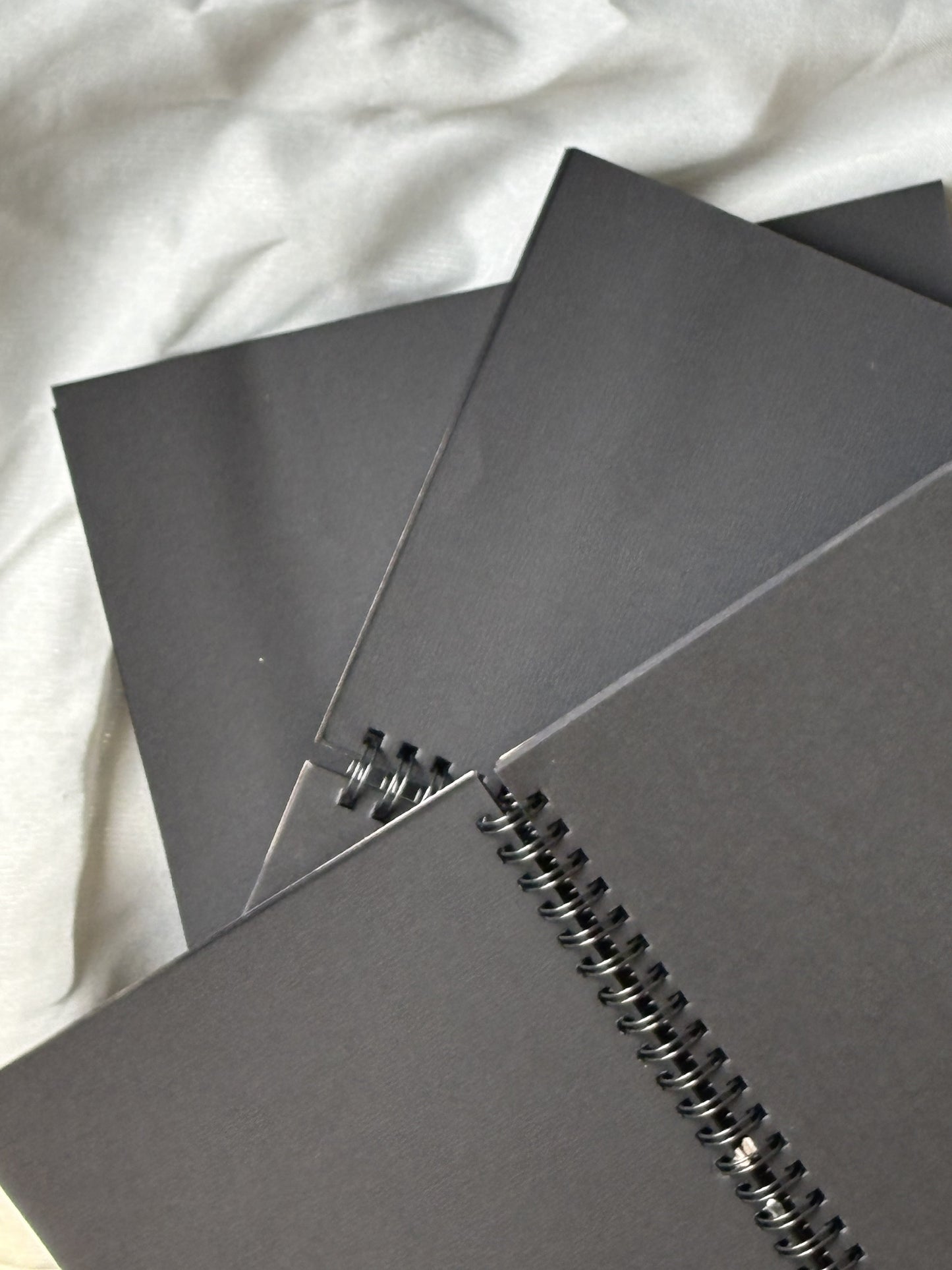 Between Worlds -  Black Paper Notebook - A6 Size