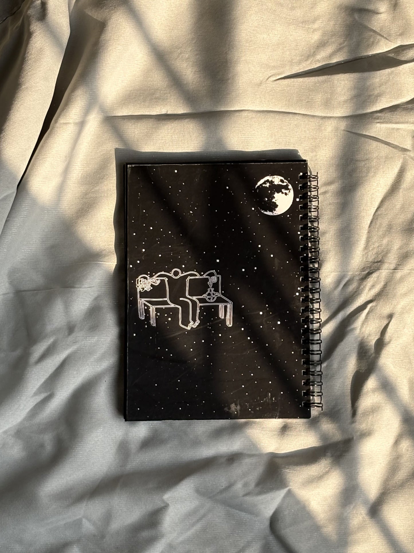 A Seat Under the Stars -  Black Paper Notebook - A5 Size