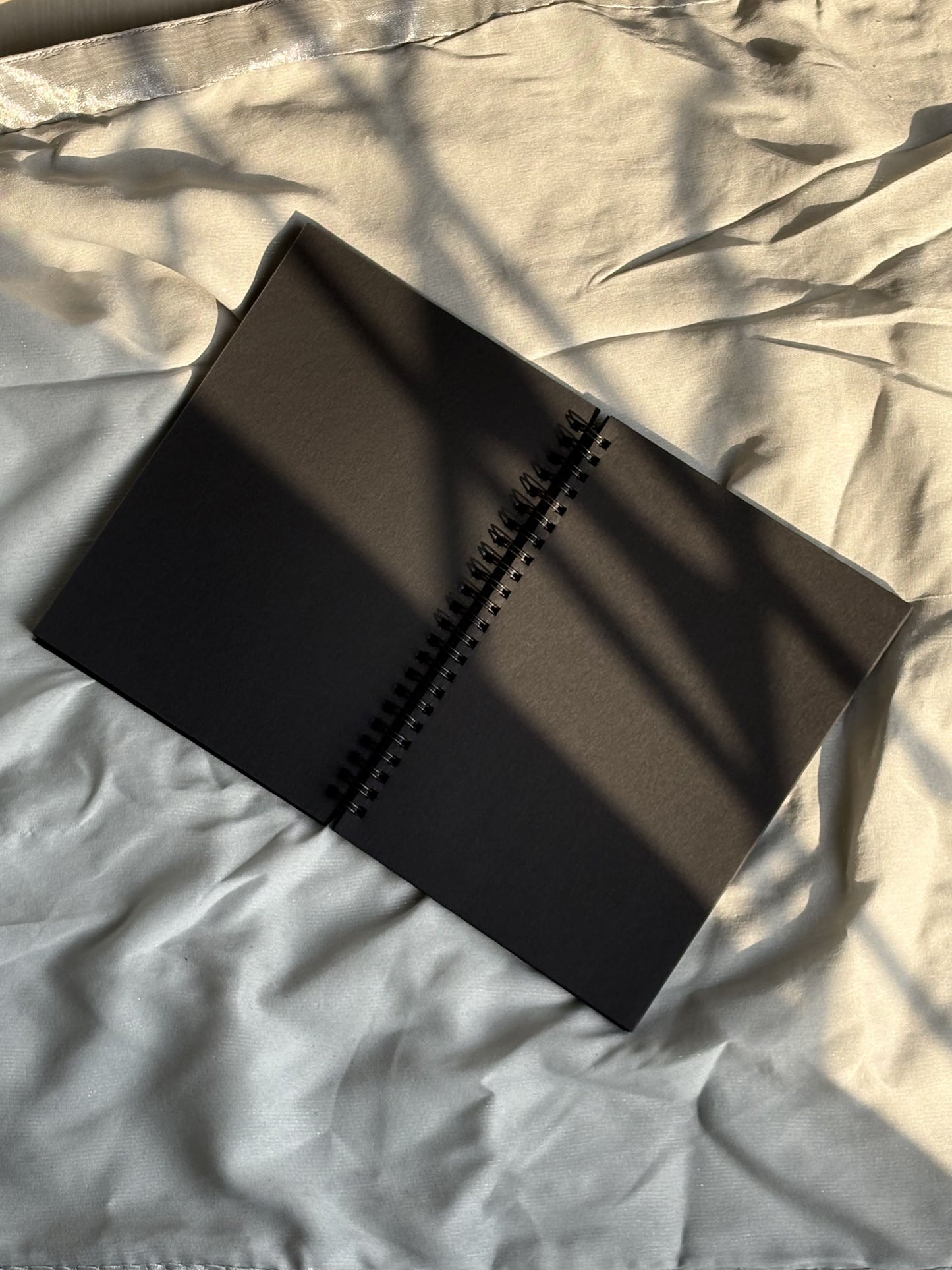 Between Worlds -  Black Paper Notebook - A6 Size